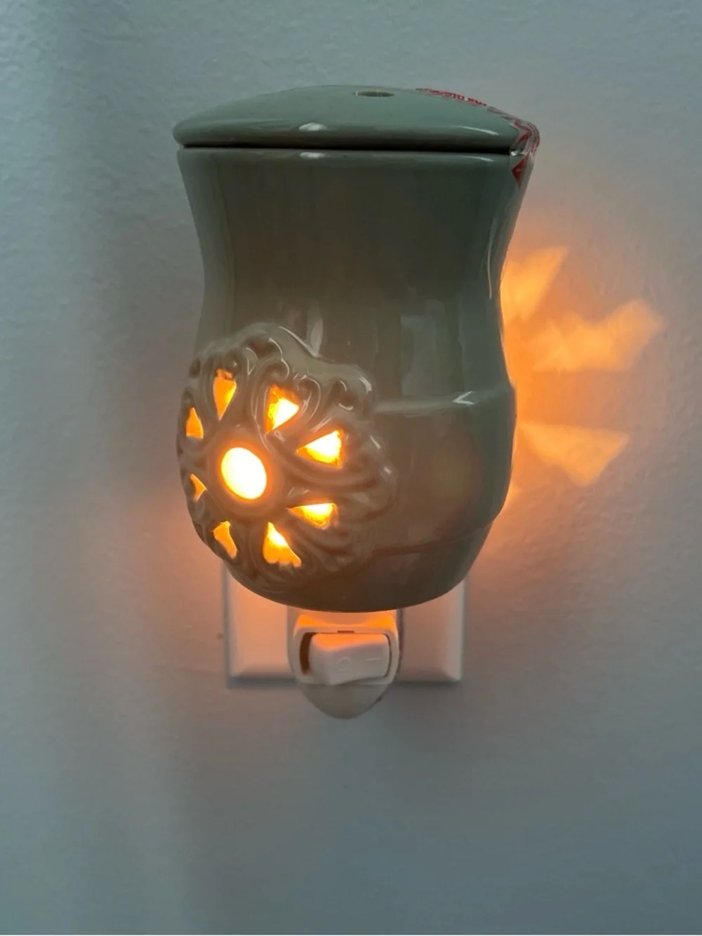 New Huntington Home teal fragrance warmer with floral design Plug- In